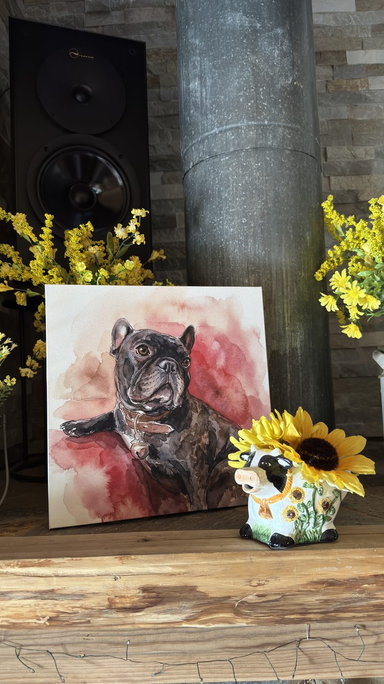 Spud's Soft Watercolour portrait hung on the mantle of a family cabin